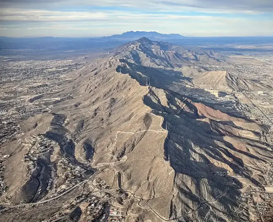Aerial view of the Franklin Mountains splitting El Paso TX, with the Hueco Bolson east and Mesilla Bolson west